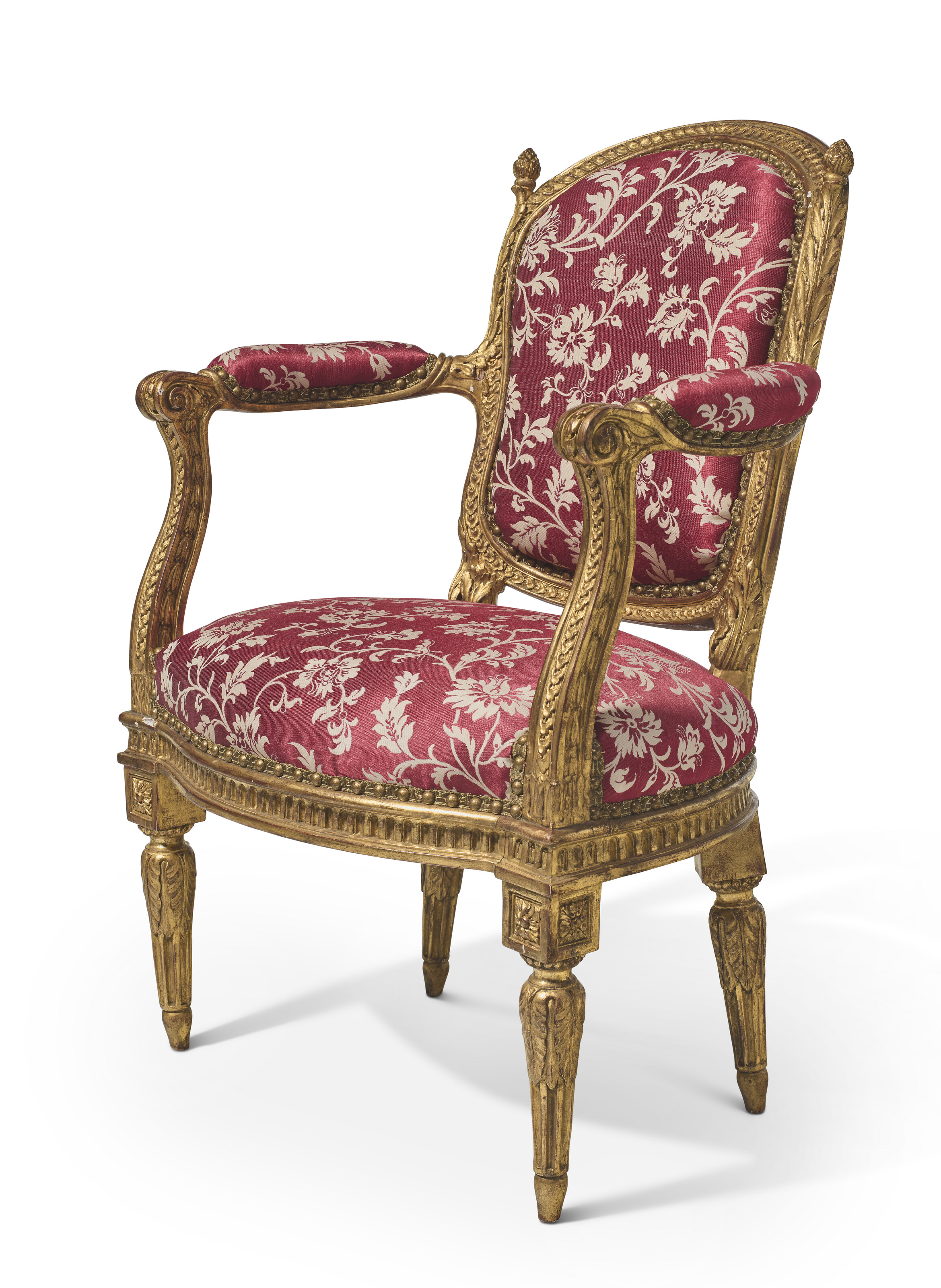 A LATE LOUIS XV GILTWOOD FAUTEUIL