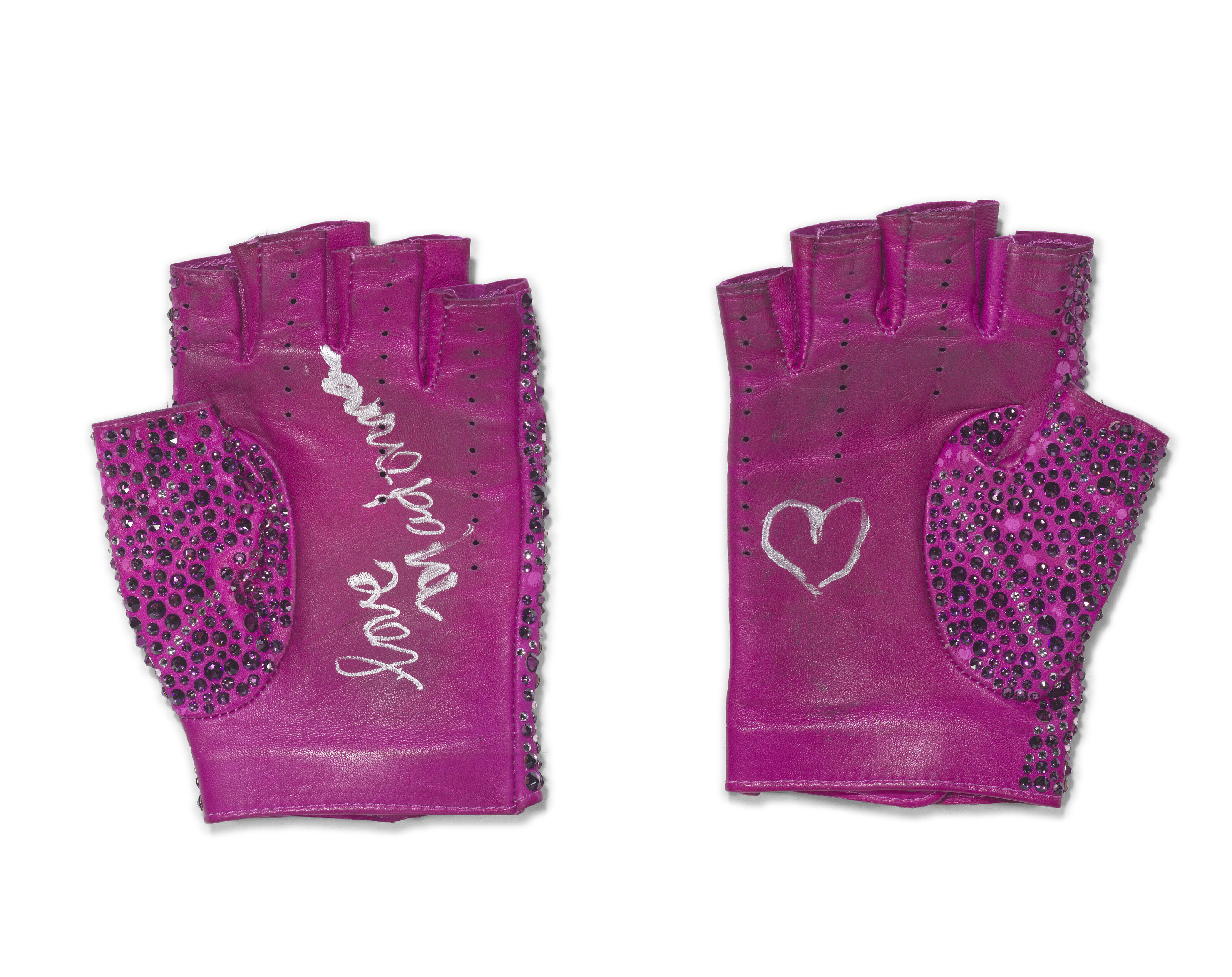 A PAIR OF FINGERLESS GLOVES WORN BY MADONNA DURING THE FIFA WORLD
