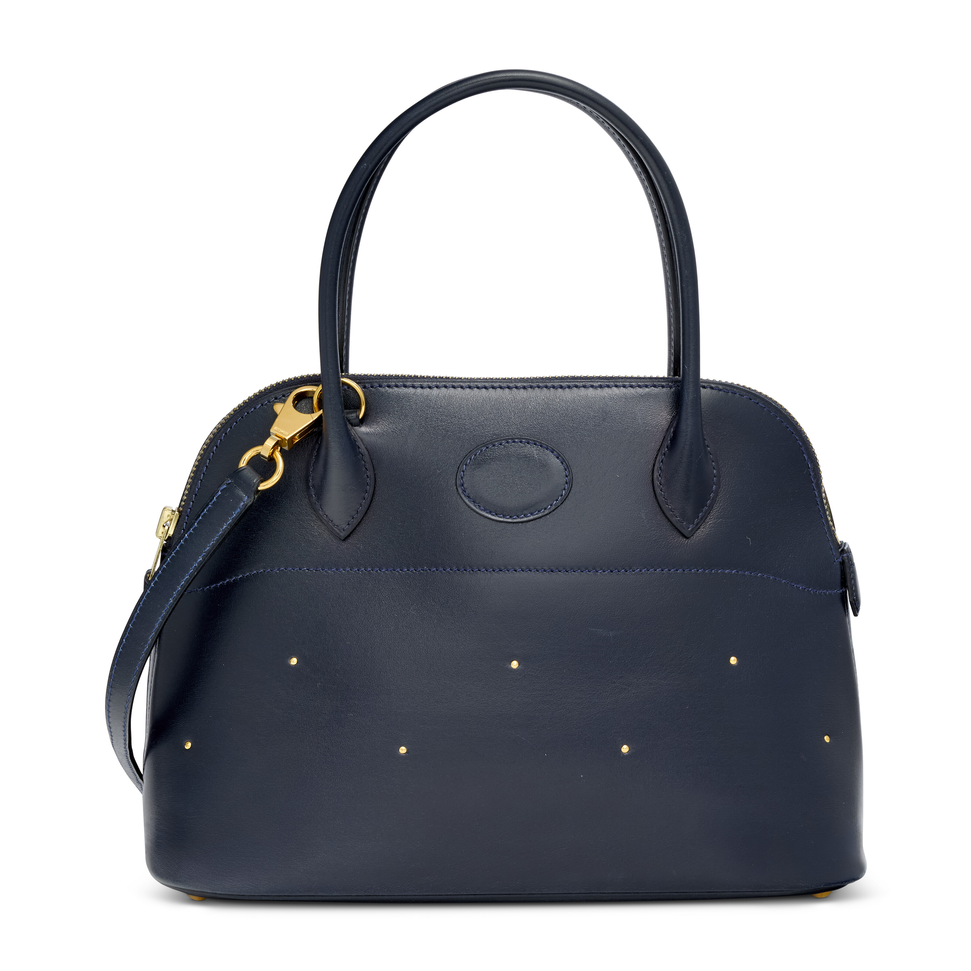 A rare, Bleu Marine calf box leather Cloute Bolide 25 with gold hardware, Hermes, 1994, offered in Handbags Online: The Paris Edit, until 24 June 2026 at Christie's Online