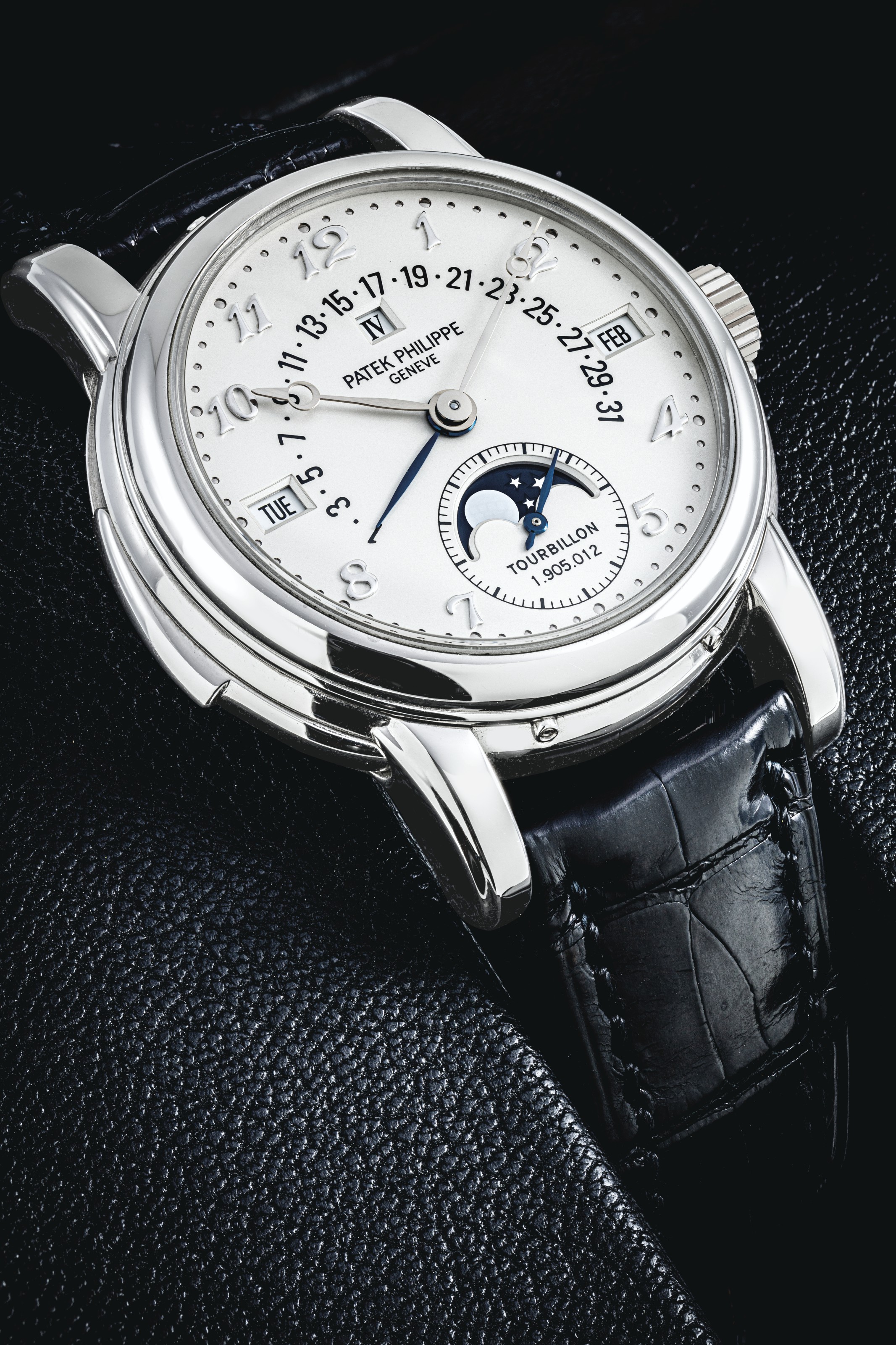 PATEK PHILIPPE. AN EXTREMELY RARE AND HIGHLY IMPORTANT PLATINUM MINUTE ...