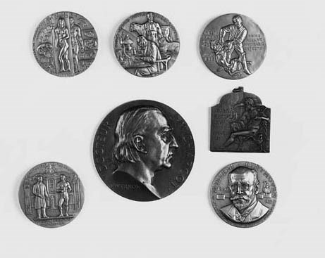 A collection of seven various bronze commemorative medallions,