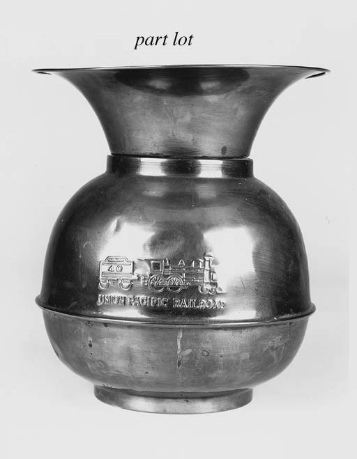 A late 19th-Century American brass spitoon,