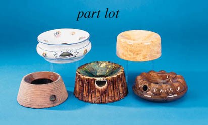 A collection of five spitoons,