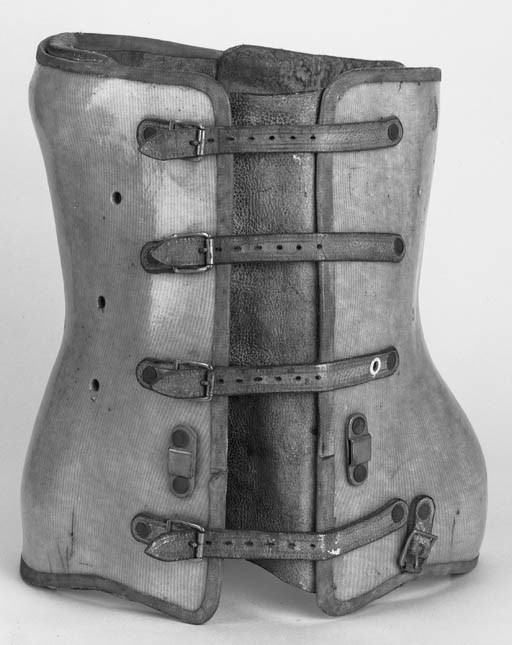 A composition, leather and fabric corset,