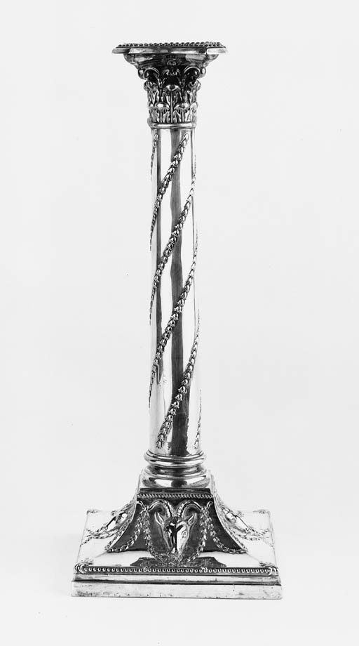 A set of four late Victorian plated candlesticks