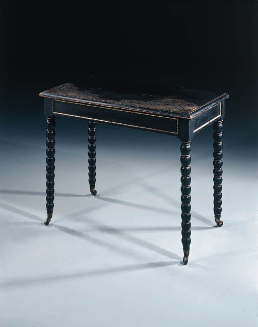 A Regency ebonised side table
