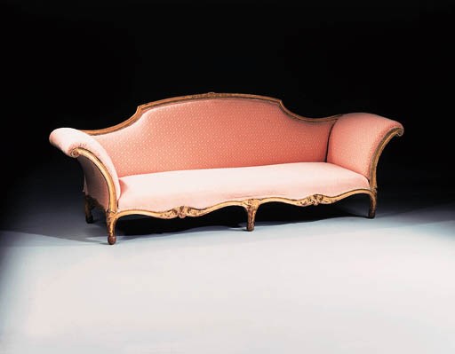 A Louis XV giltwood canape