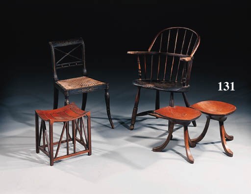 A pair of walnut Thebes stools