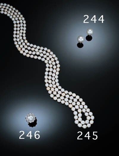 A NATURAL PEARL AND DIAMOND RING