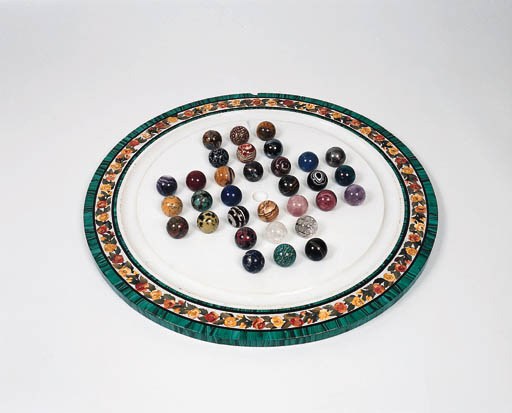 A Marble Solitaire Game board