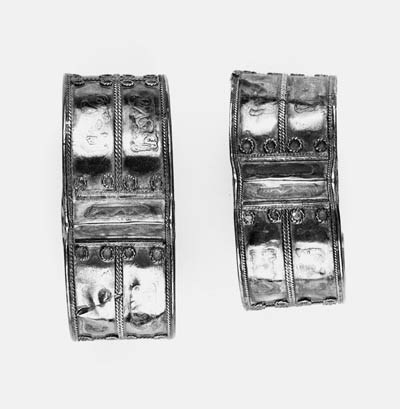 A PAIR OF KHORASSAN SILVER NIELLO BANGLES