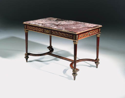 A French ormolu-mounted kingwood and mahogany centre table