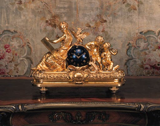 A Napoleon III ormolu and enamelled mantel clock