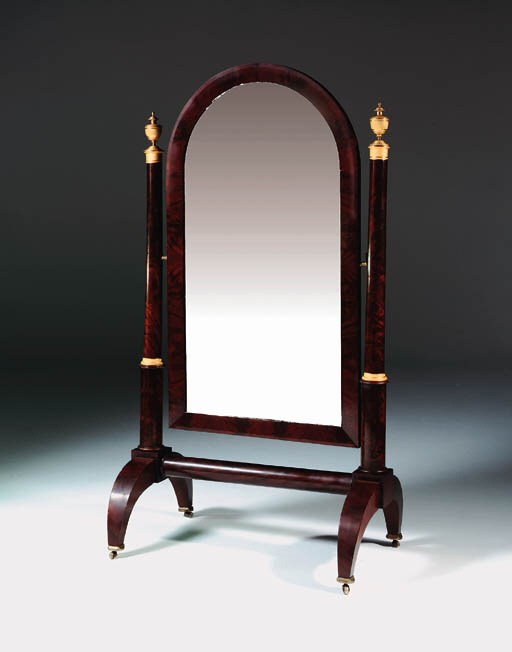A French Empire ormolu-mounted mahogany cheval mirror