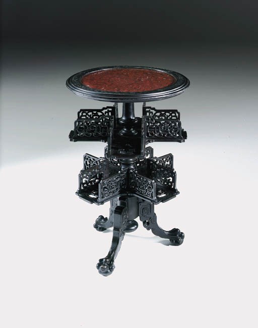 A French ebonised and griotte marble whatnot
