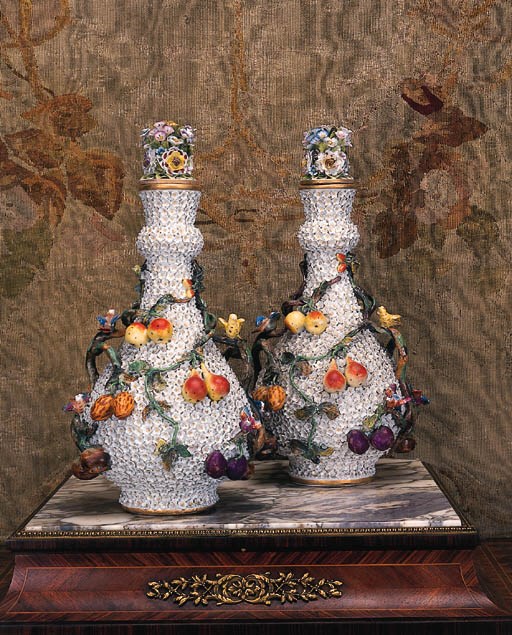 A pair of Meissen bottle vases and covers