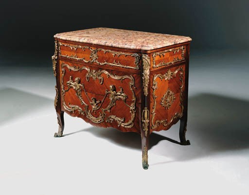 A French ormolu-mounted kingwood and walnut secretaire-commode
