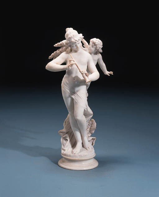 An Italian white marble group of Venus and Cupid