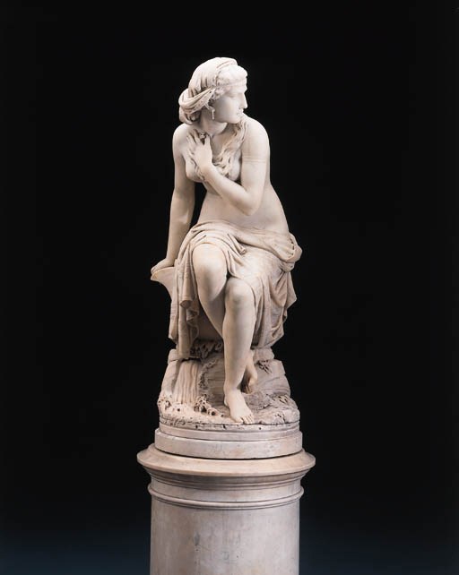 An Italian white marble figure of Suzanna, on pedestal