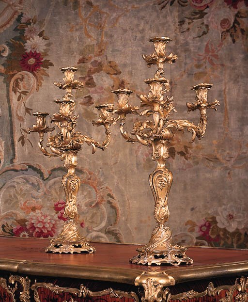 A pair of French ormolu four-branch candelabra
