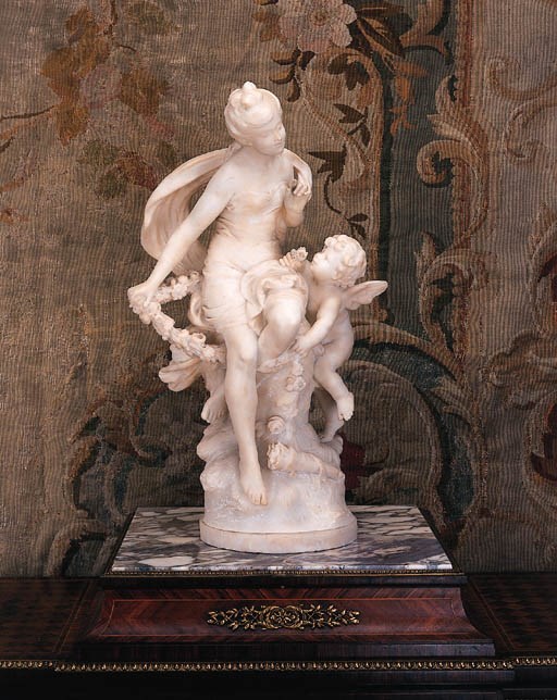 A French white marble group of Venus and Cupid