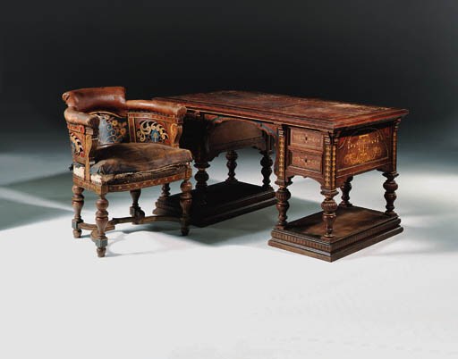 A French parcel-gilt and polychrome-decorated walnut pedestal desk and tub chair