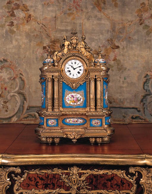 An ormolu and Sevres-pattern turquoise-ground porcelain-mounted mantel clock