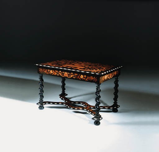 An ivory and marquetry-inlaid ebonised centre table