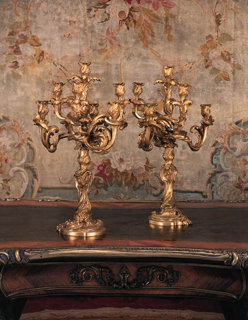A pair of French ormolu six-light candelabra