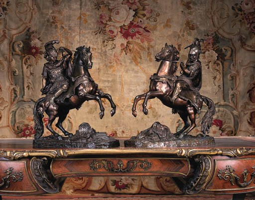 A pair of equestrian bronze groups