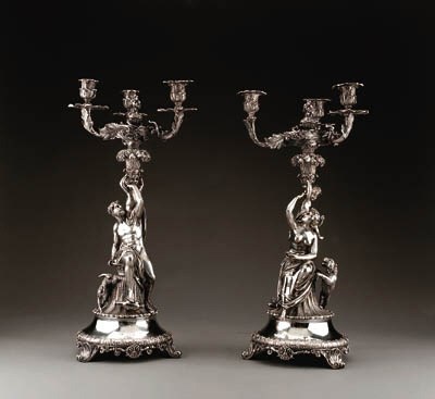 A PAIR OF GEORGE IV SILVER THREE-LIGHT CANDELABRA