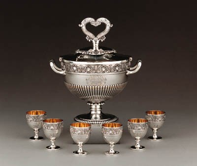 A REGENCY SILVER EGG CODDLER WITH SIX EGG CUPS