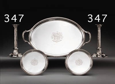 A PAIR OF GEORGE II SILVER CANDLESTICKS