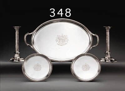 A GEORGE IV SILVER TEA TRAY AND A PAIR OF MATCHING SALVERS