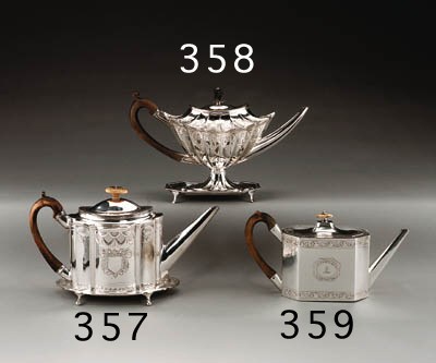 A GEORGE III SILVER TEAPOT AND STAND**