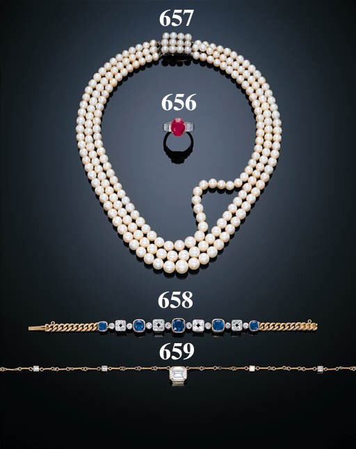 A THREE-STRAND PEARL NECKLACE