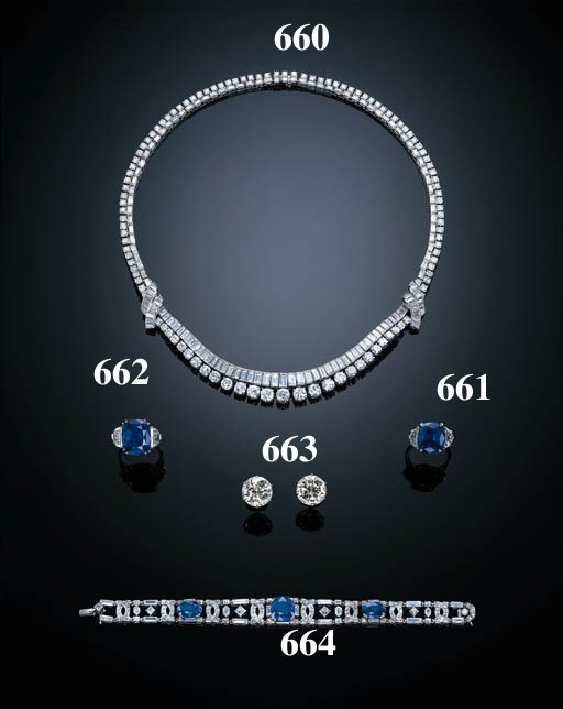 A PAIR OF CIRCULAR-CUT DIAMOND EARSTUDS