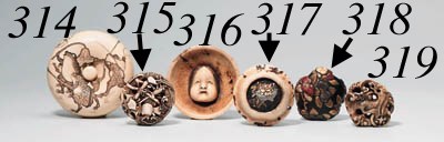 AN IVORY RYUSA MANJU NETSUKE