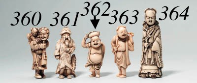 AN IVORY NETSUKE