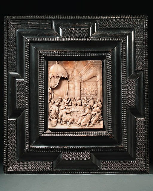 A CARVED ALABASTER RELIEF OF THE LAST SUPPER