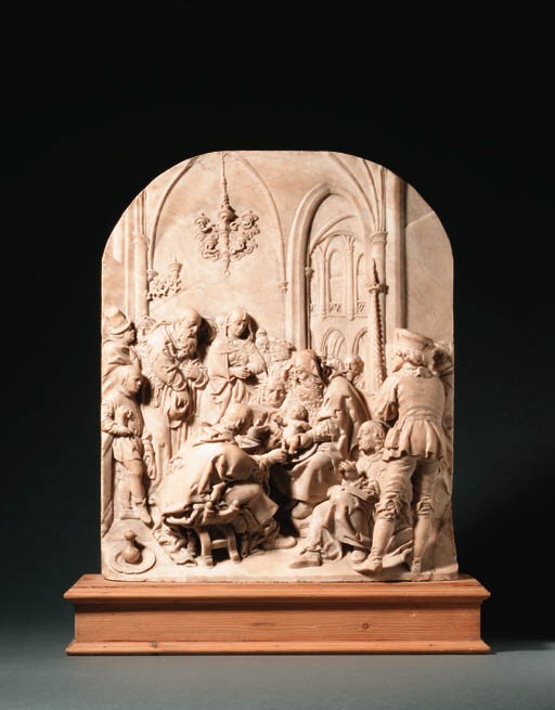 A CARVED ALABASTER RELIEF OF THE CIRCUMCISION