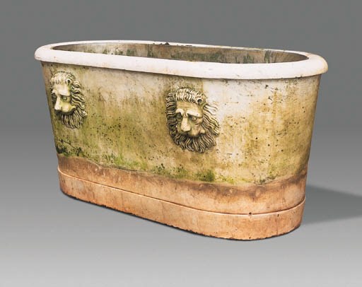 A CARVED MARBLE BATH
