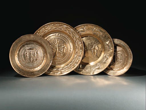 A BRASS ALMS DISH