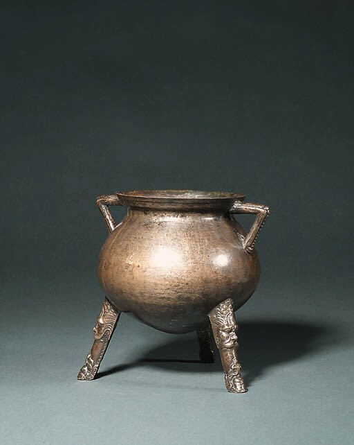 A TRIPOD BRONZE CAULDRON