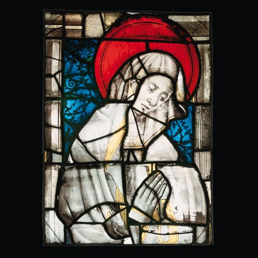A RECTANGULAR STAINED GLASS PANEL DEPICTING THE VIRGIN