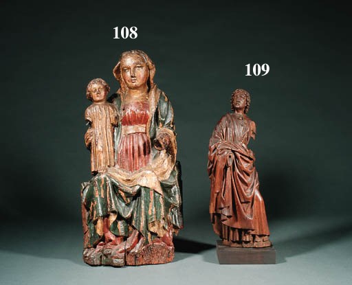 A PARCEL-GILT POLYCHROME CARVED WOODEN GROUP OF THE VIRGIN AND CHILD