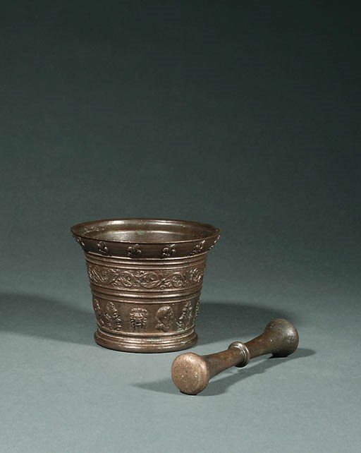 A BRONZE MORTAR AND PESTLE