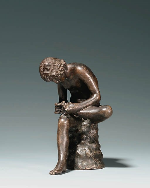 A BRONZE FIGURE OF THE SPINARIO