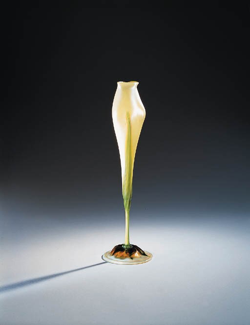 A FAVRILE GLASS FLORIFORM VASE