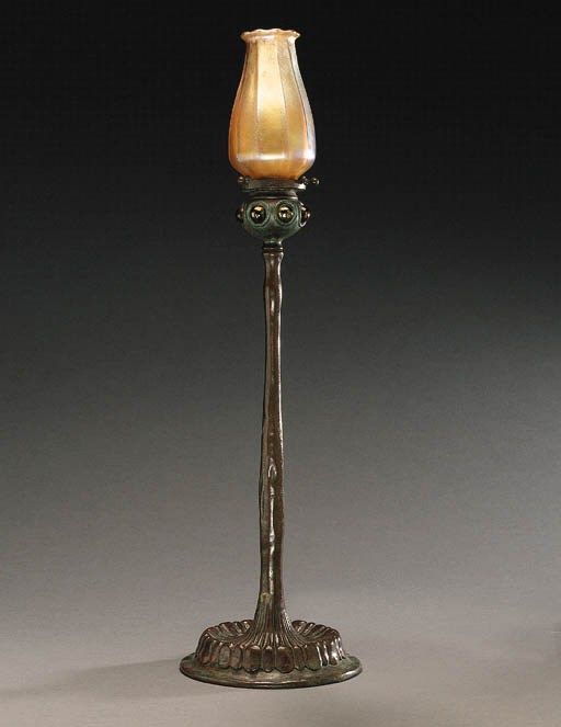 A FAVRILE GLASS AND BRONZE CANDLE LAMP